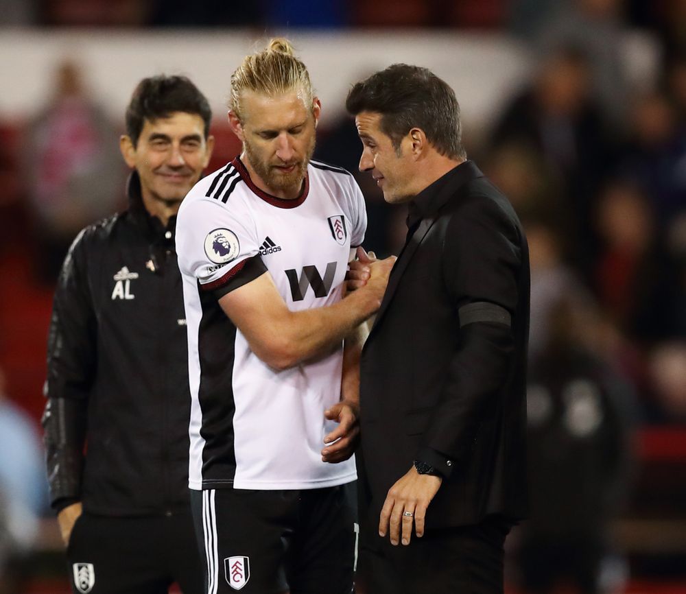 Marco Silva celebrates with Tim Ream Marco Silva celebrates with Tim Ream