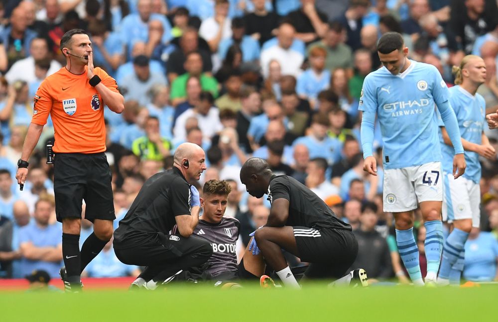Tom Cairney receives treatment at the Etihad Tom Cairney receives treatment at the Etihad