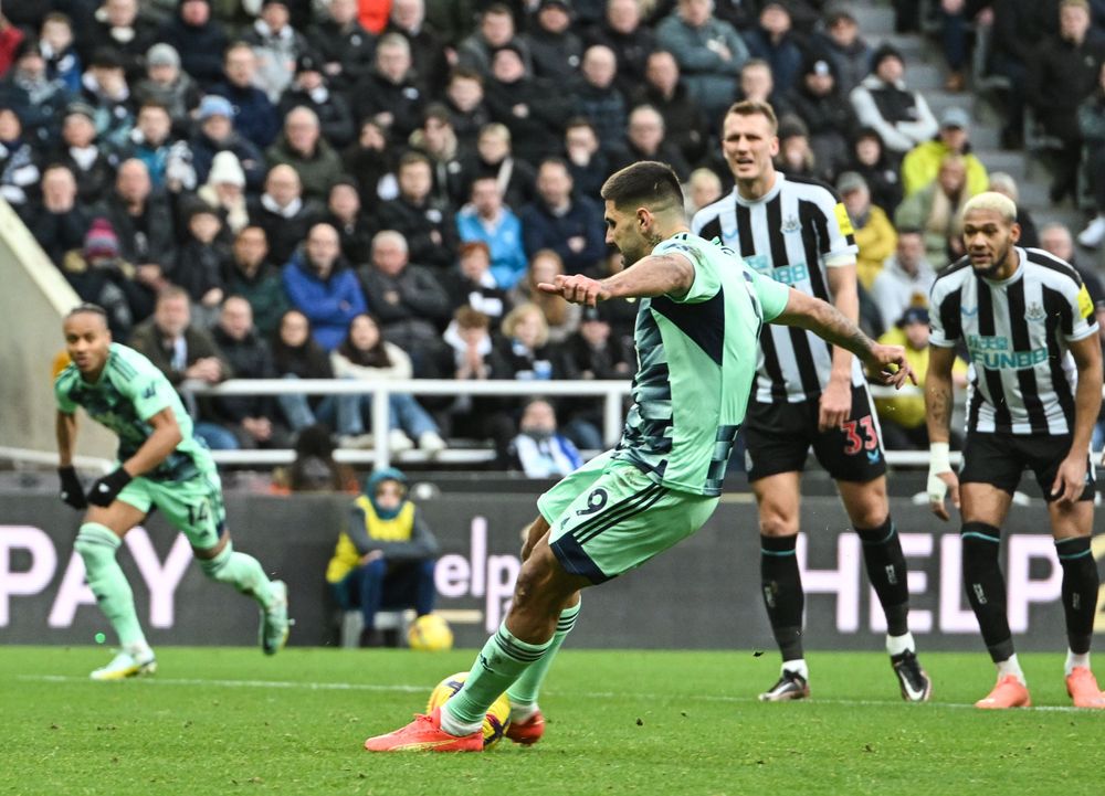 Aleksandar Mitrović is unfortunate to slip as he connects with his penalty at Newcastle