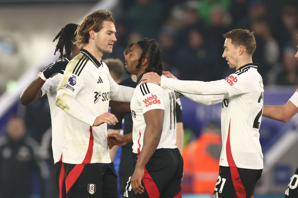 Adama Traore is congratulated after scoring Fulham's second goal