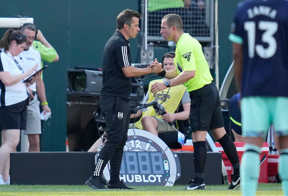 Marco Silva shakes hands with the referee Marco Silva shakes hands with the referee