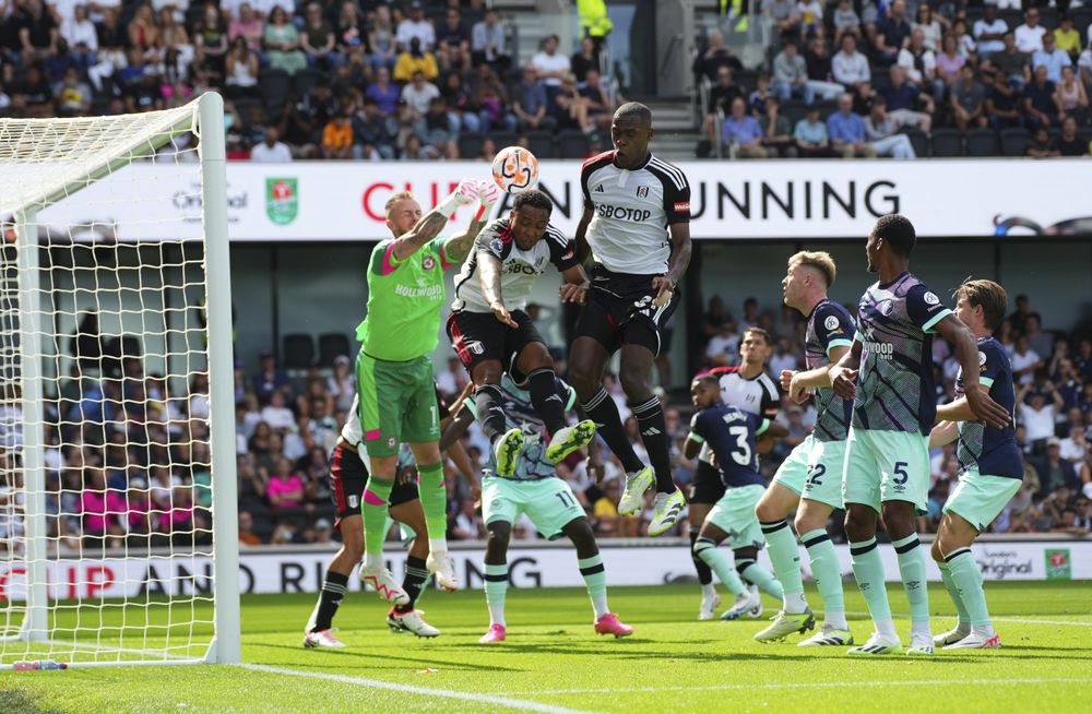 Kenny Tete and Issa Diop go up for the header Kenny Tete and Issa Diop go up for the header