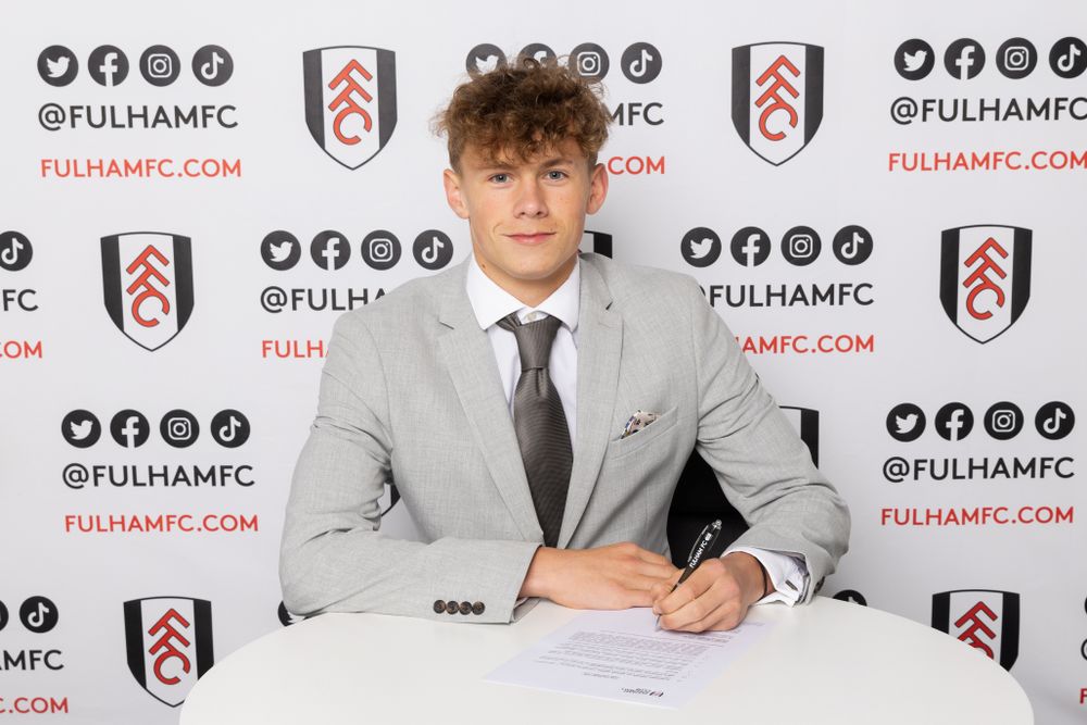 Fulham's Alex Faux signs his scholarship Fulham's Alex Faux signs his scholarship