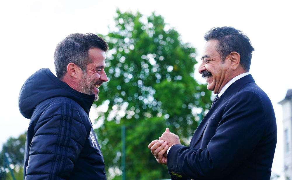 Marco Silva chats with Mr Khan at Motspur Park