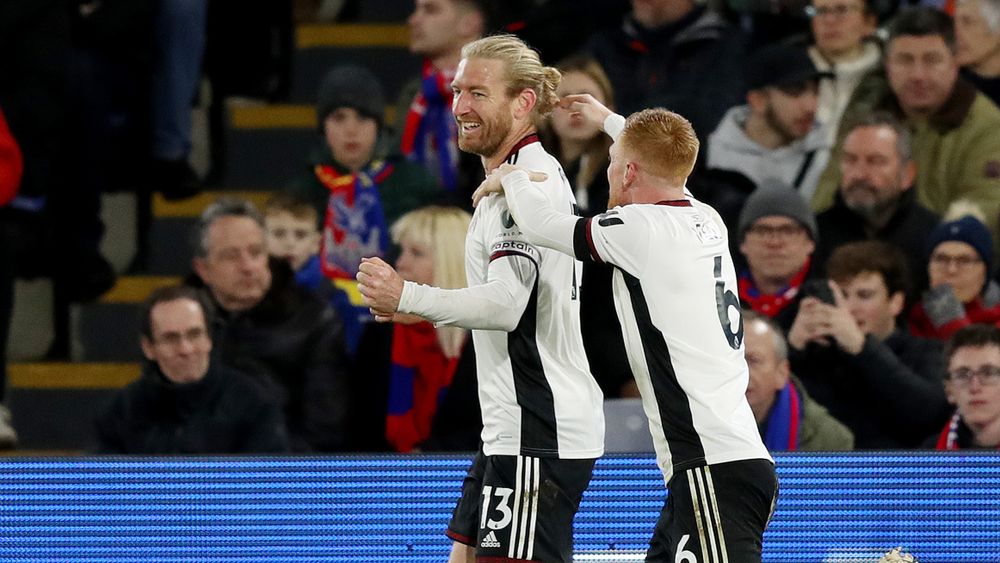 Tim Ream celebrates scoring against Crystal Palace Tim Ream celebrates scoring against Crystal Palace