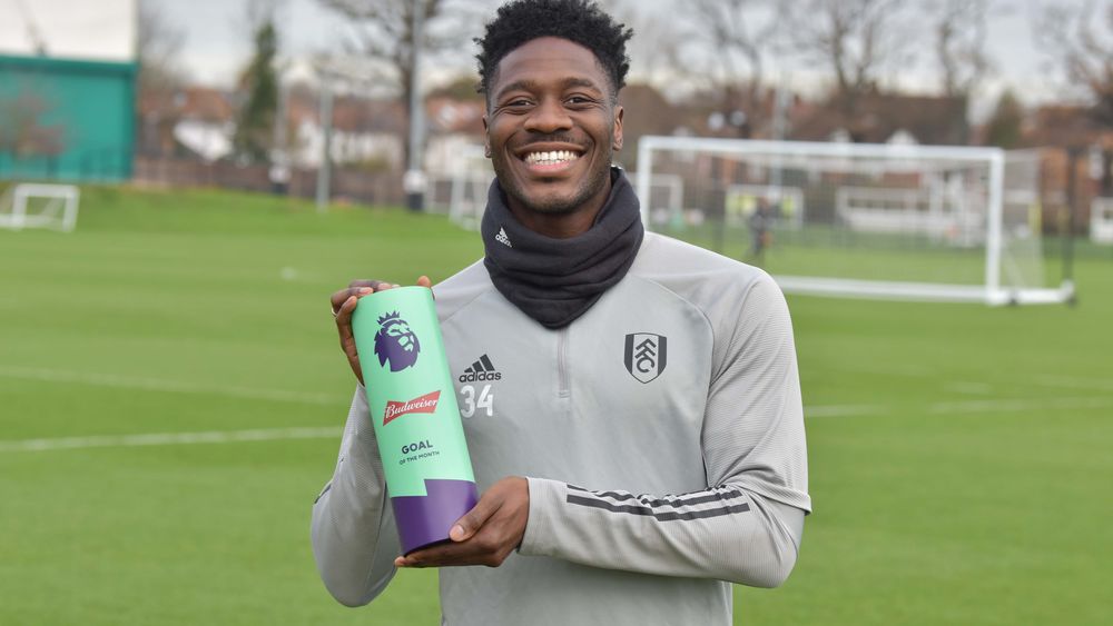 Ola Aina with the November Goal of the Month trophy Ola Aina with the November Goal of the Month trophy