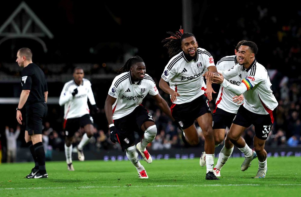 The players celebrate Alex Iwobi's second goal The players celebrate Alex Iwobi's second goal