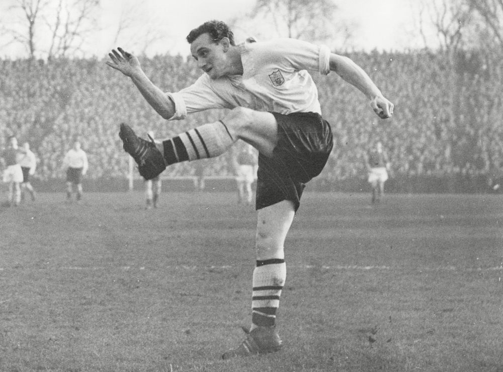 Tosh Chamberlain lets fly with a shot Tosh Chamberlain lets fly with a shot