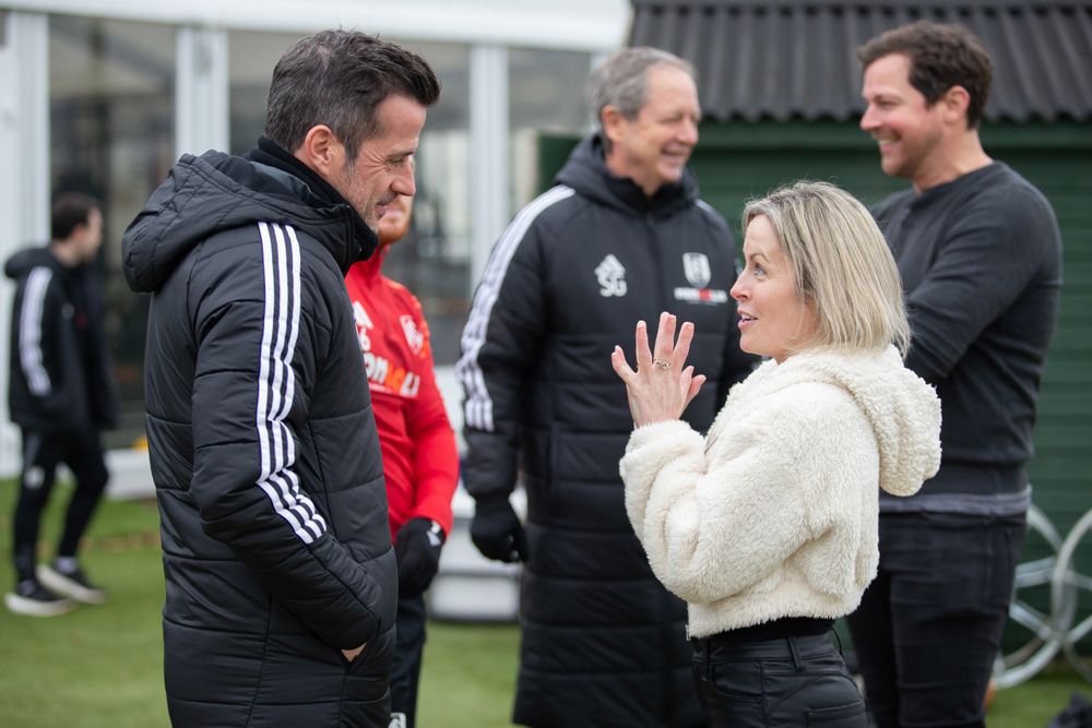 Clare Parish chats with Marco Silva ahead of training