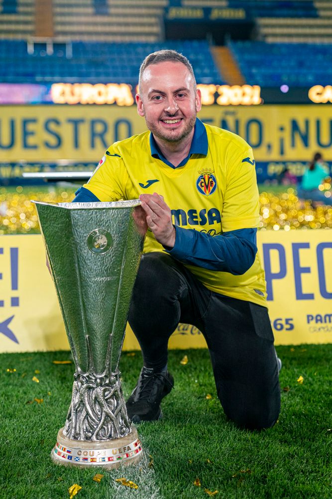 Thomas McIlroy with the trophy following Villarreal's Europa League triumph Thomas McIlroy with the trophy following Villarreal's Europa League triumph