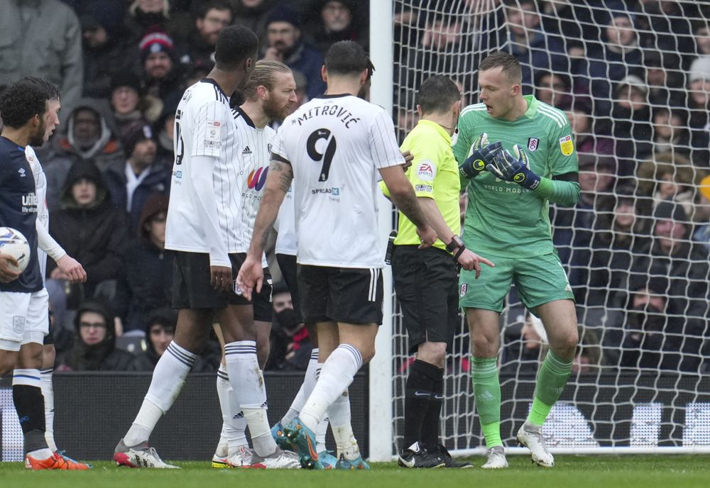 Marek Rodák asks for some clarification from the referee