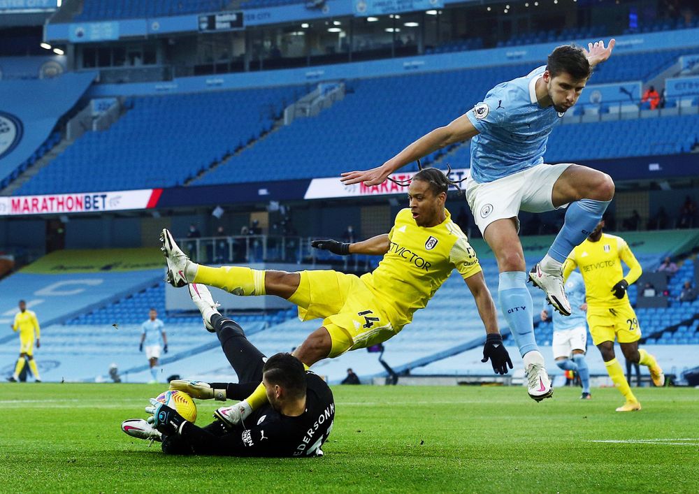 Bobby De Cordova-Reid goes down in the Manchester City box. Bobby De Cordova-Reid goes down in the Manchester City box.