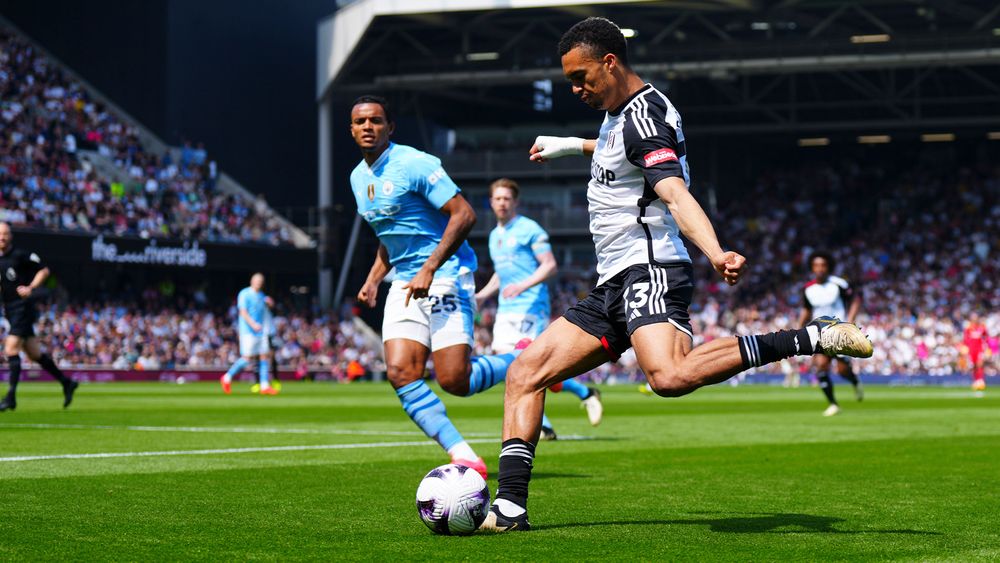 Fulham defender Antonee Robinson crosses the ball against Manchester City Fulham defender Antonee Robinson crosses the ball against Manchester City