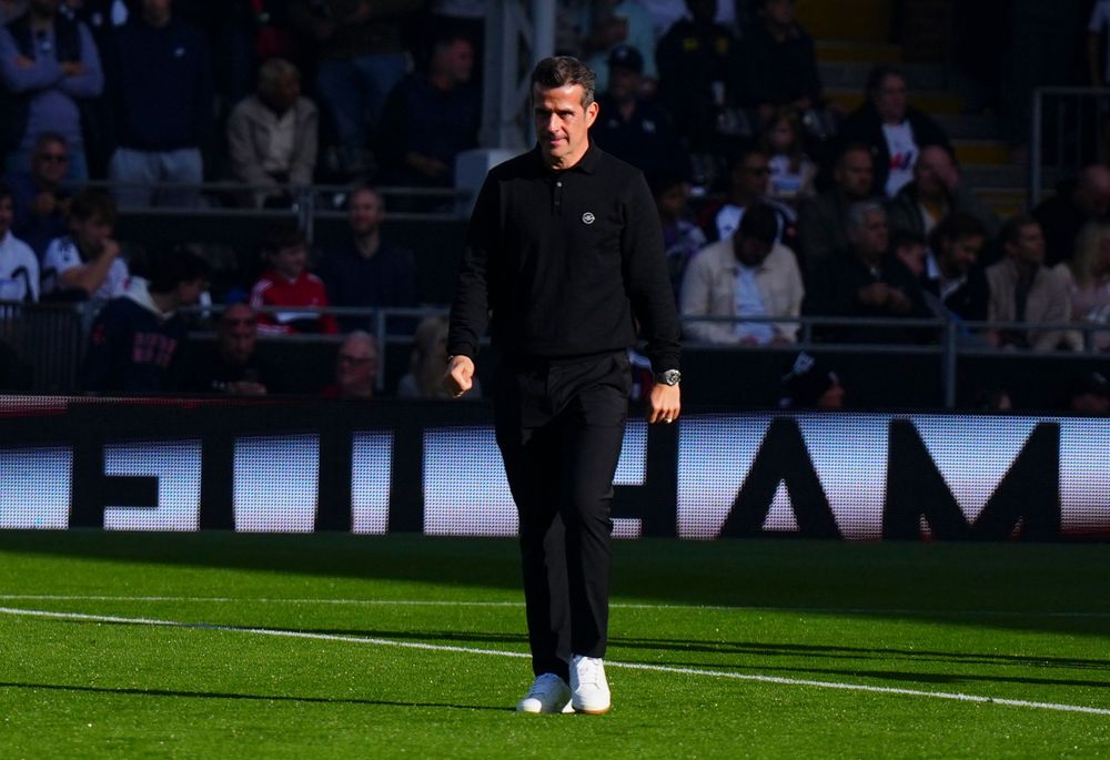 Marco Silva walks across the Craven Cottage pitch Marco Silva walks across the Craven Cottage pitch