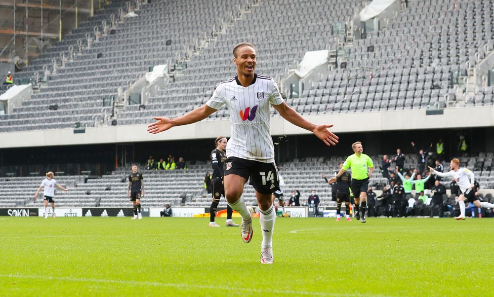 Bobby De Cordova-Reid wheels away in celebration after scoring Fulham's third Bobby De Cordova-Reid wheels away in celebration after scoring Fulham's third