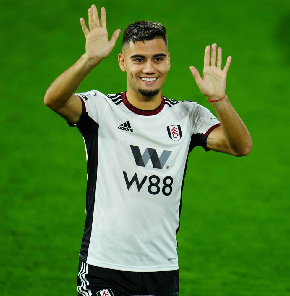 Andreas Pereira waves to his family following Fulham's match against Everton Andreas Pereira waves to his family following Fulham's match against Everton