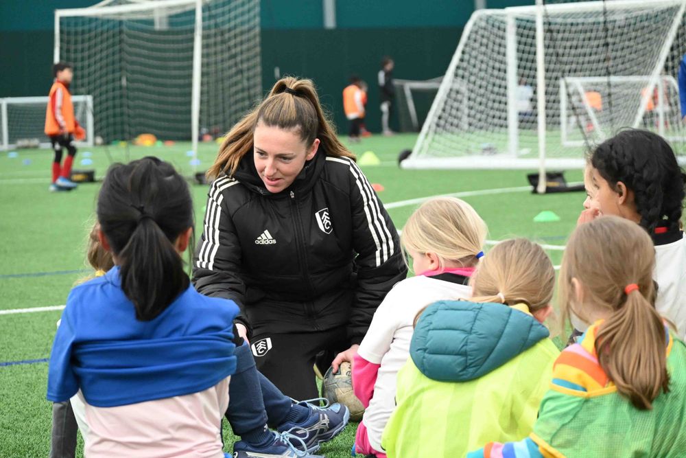 A Foundation coach leads a session