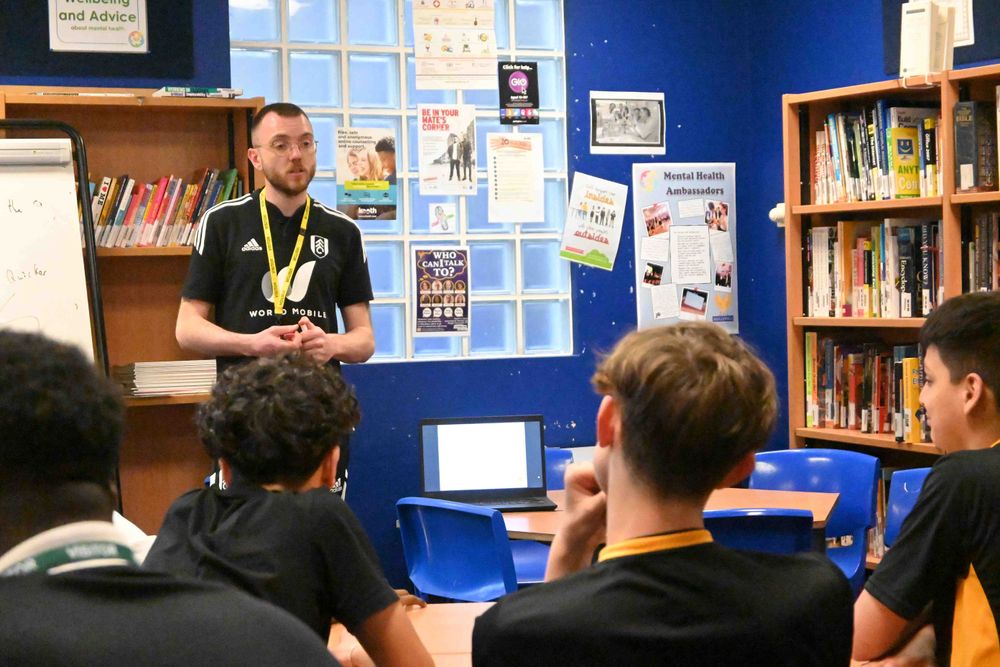 A Foundation coach leads a session