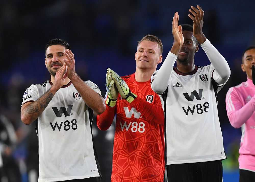 Mitro, Bernd and Tosin applaud the aways support.