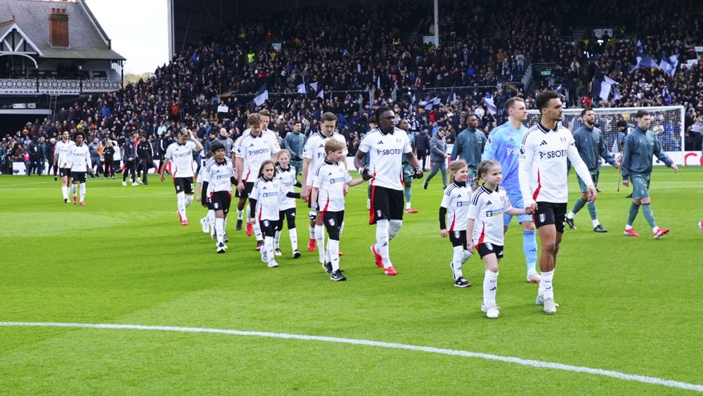 Fulham walk out ahead of the Spurs game Fulham walk out ahead of the Spurs game