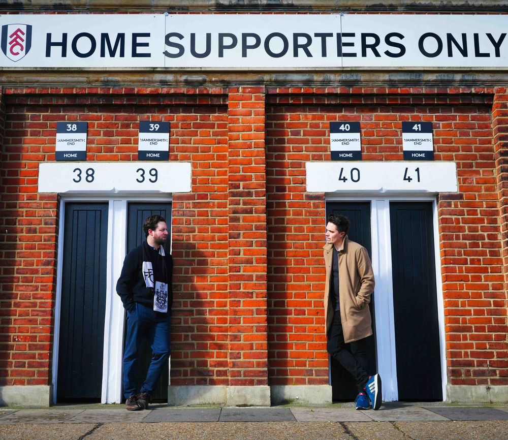 Felix White and Ivan Berry outside the home turnstiles Felix White and Ivan Berry outside the home turnstiles