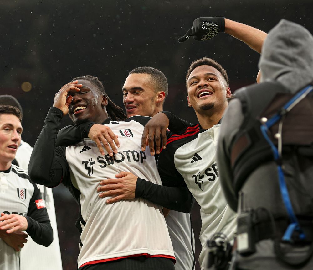 Calvin Bassey celebrates scoring at Old Trafford