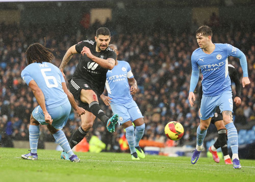 Mitro shoots at goal Mitro shoots at goal