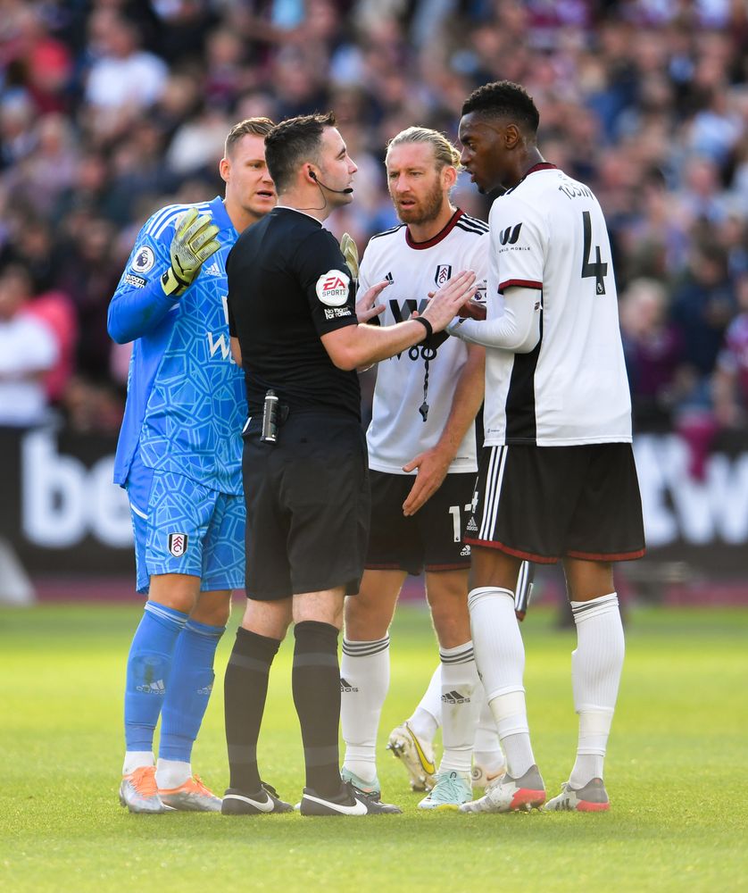 Fulham's players seek clarification from referee Chris Kavanagh Fulham's players seek clarification from referee Chris Kavanagh