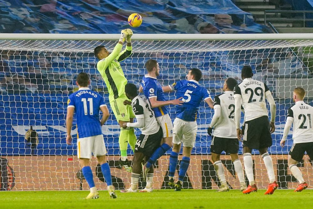 Alphonse Areola punches a corner clear