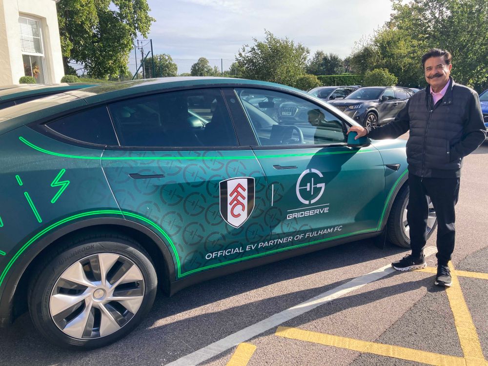 Mr Khan with a Gridserve car Mr Khan with a Gridserve car