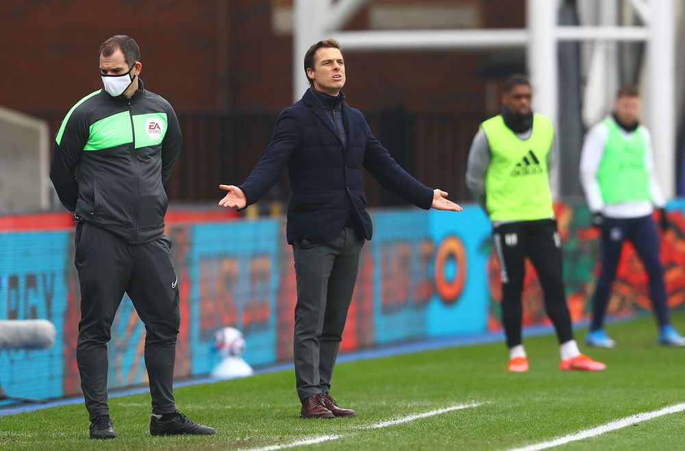 Scott Parker gestures as he watches on
