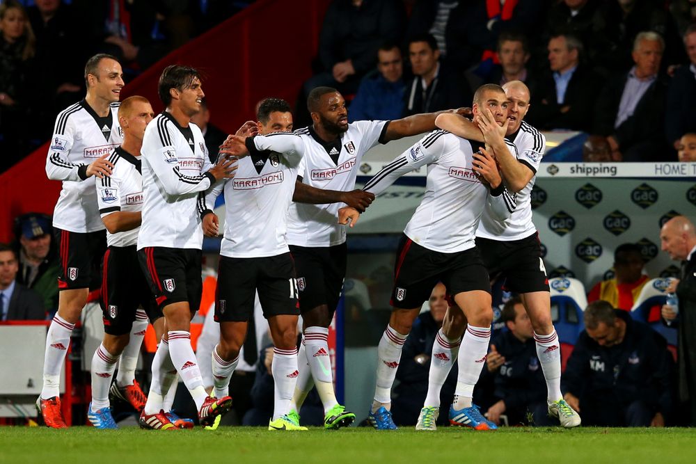 Philippe Senderos congratulates Pajtim Kasami on his goal Philippe Senderos congratulates Pajtim Kasami on his goal