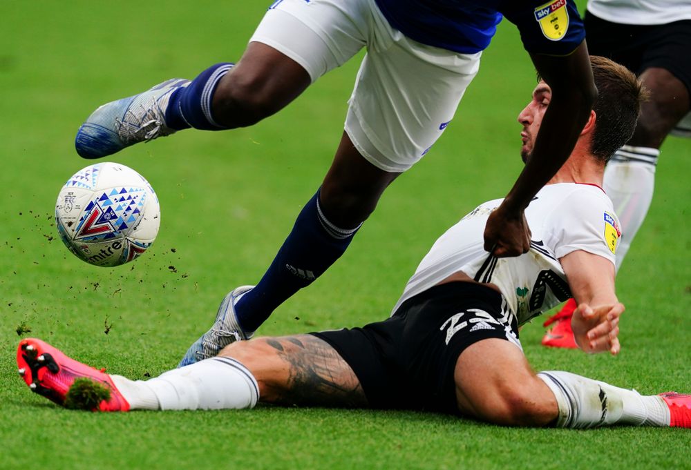 Joe Bryan wins a tackle against Birmingham City