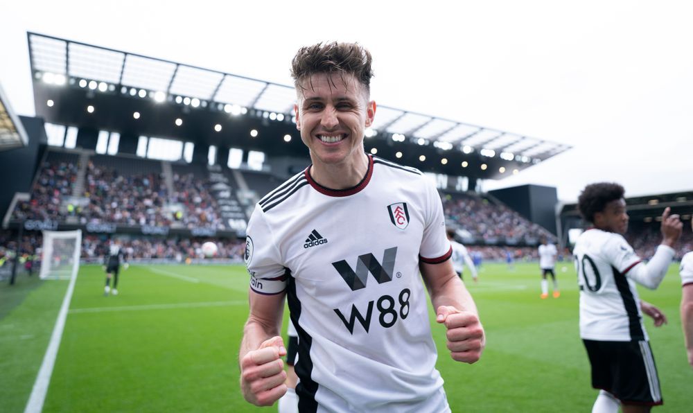 Tom Cairney celebrates scoring against Leicester