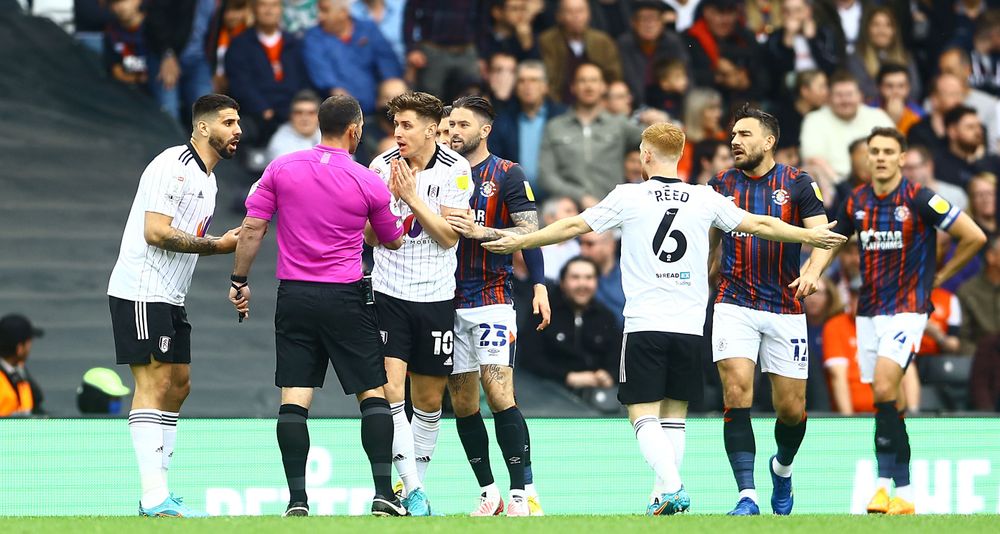 Fulham players appeal for a potential penalty Fulham players appeal for a potential penalty