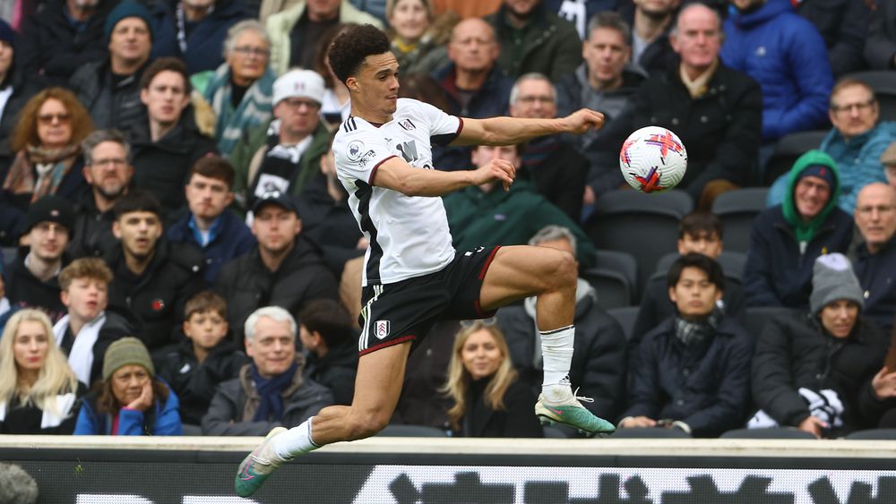 Antonee Robinson controls the ball in mid-air