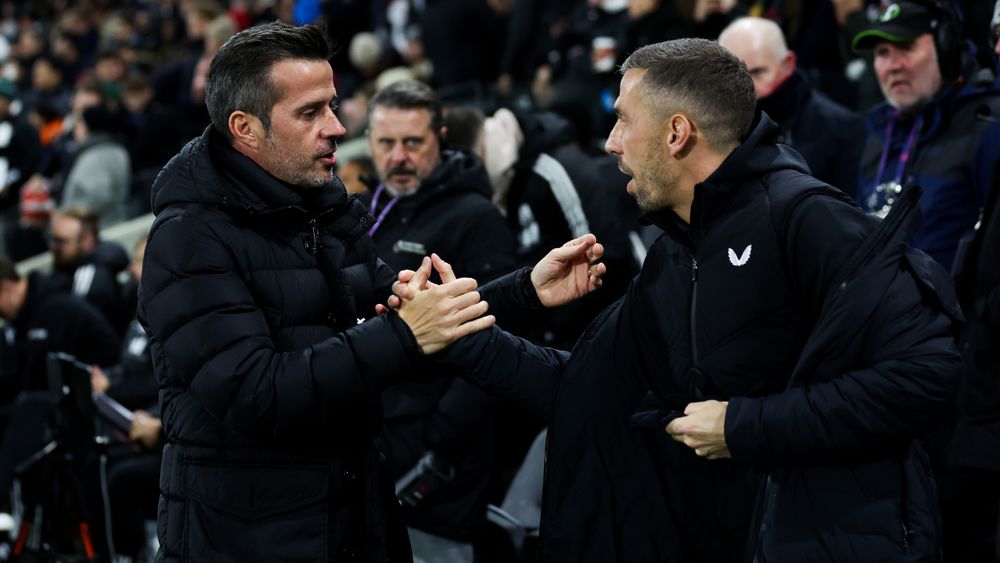 Marco Silva greets Gary O'Neil Marco Silva greets Gary O'Neil