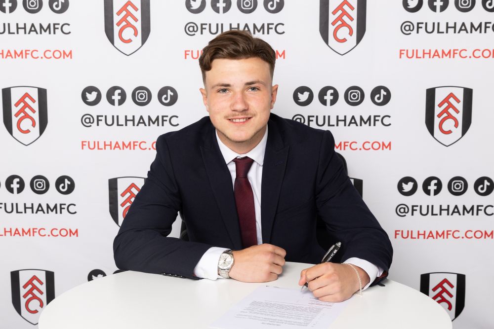 Fulham's Oliver Mayer signs his scholarship Fulham's Oliver Mayer signs his scholarship