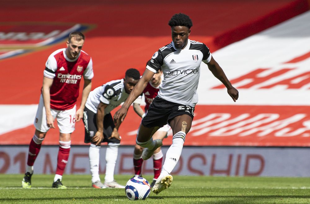 Josh Maja plants his penalty in the net to put Fulham in front.