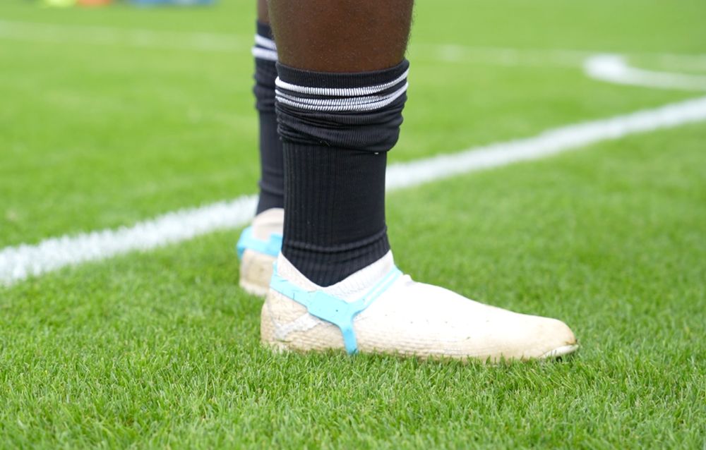 A player pictured with Playermaker sensors strapped to their boot A player pictured with Playermaker sensors strapped to their boot
