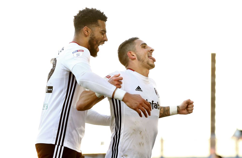 Cyrus Christie celebrates with Anthony Knockaert
