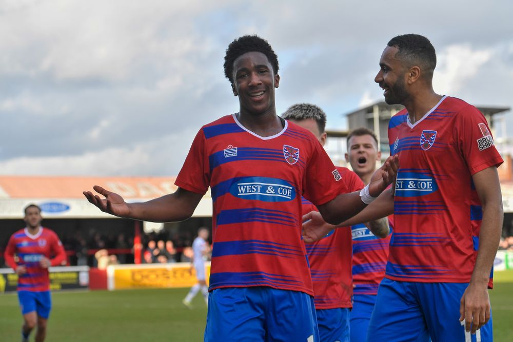 Aaron Loupalo-Bi celebrates scoring for Dagenham & Redbridge Aaron Loupalo-Bi celebrates scoring for Dagenham & Redbridge